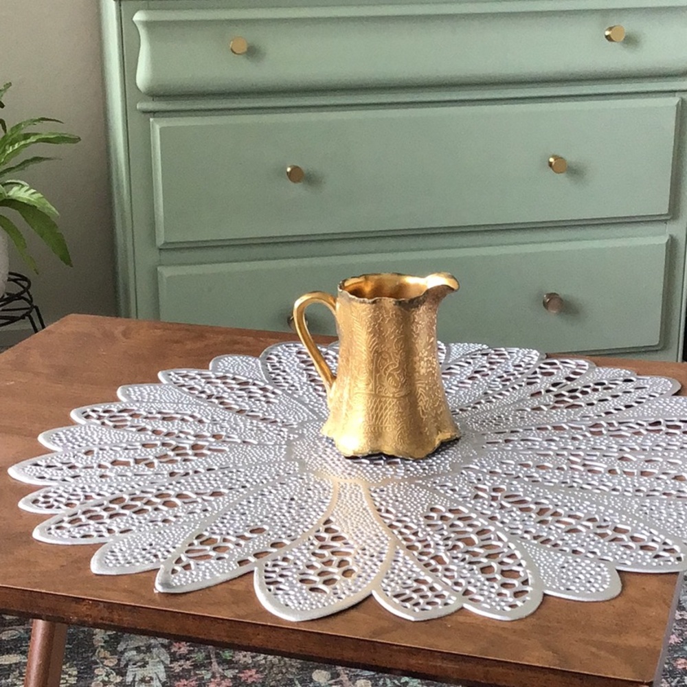 Vintage gold-encrusted creamer made by the Wheeling Decorating Company.